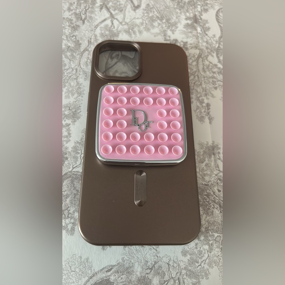 Dior beauty phone accessory with suction